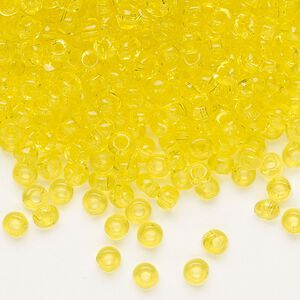 Seed bead, Dyna-Mites&trade;, glass, transparent yellow, #6 round. Sold per 1/2 kilogram pkg.