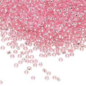 Seed bead, TOHO BEADS&reg;, glass, pkg/50g, #11 round, transparent silver-lined pink (TR-11-38).