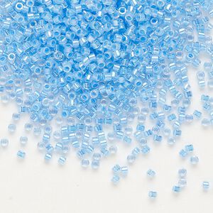 Seed bead, Delica&reg;, glass, pkg/7.5g, #11 round, translucent light blue-lined rainbow crystal clear (DB-0076).