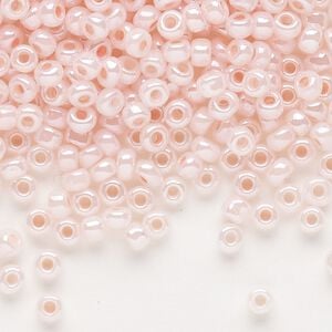 Seed bead, Dyna-Mites&trade;, glass, opaque ceylon pastel pink, #6 round. Sold per 1/2 kilogram pkg.