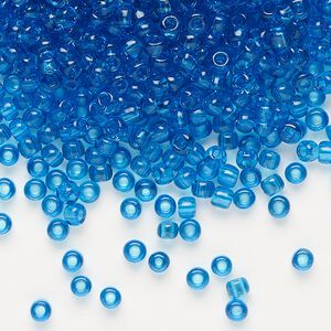 Seed bead, Dyna-Mites&trade;, glass, transparent turquoise blue, #8 round. Sold per 1/2 kilogram pkg.