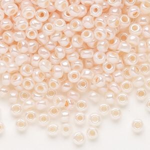 Seed bead, Dyna-Mites&trade;, glass, opaque ceylon pastel peach, #6 round. Sold per 1/2 kilogram pkg.