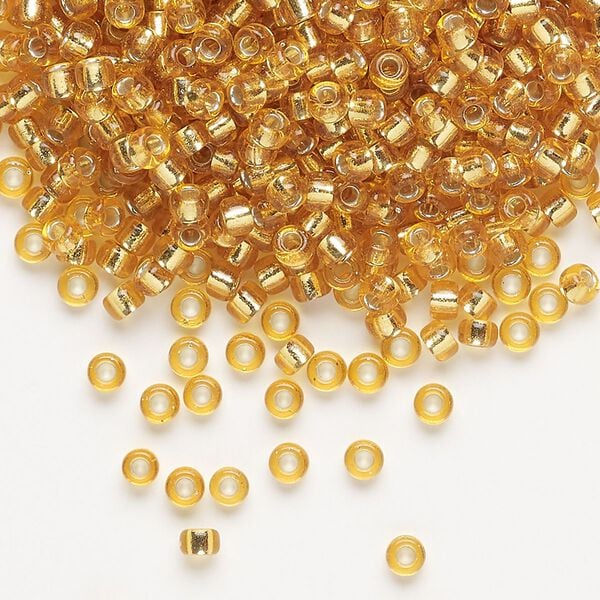Seed bead, Miyuki, glass, pkg/50g, #8 rocaille, transparent silver-lined dark gold (RR-4). image number 0