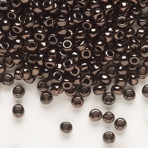 Seed bead, Dyna-Mites&trade;, glass, opaque iris dark bronze, #6 round. Sold per 1/2 kilogram pkg.