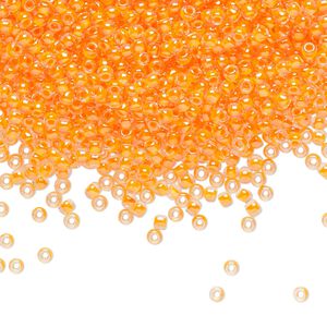 Seed bead, TOHO BEADS&reg;, glass, pkg/7.5g, #11 round, translucent luminous inside color neon orange (TR-11-802).