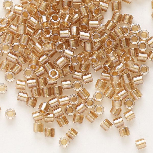 Seed bead, Delica&reg;, glass, pkg/7.5g, #8 round, translucent honey beige-lined luster crystal clear (DBL-0901). image number 0