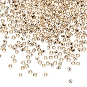 Seed bead, TOHO BEADS&reg;, glass, pkg/7.5g, #11 round, transparent silver-lined rosaline (TR-11-31).