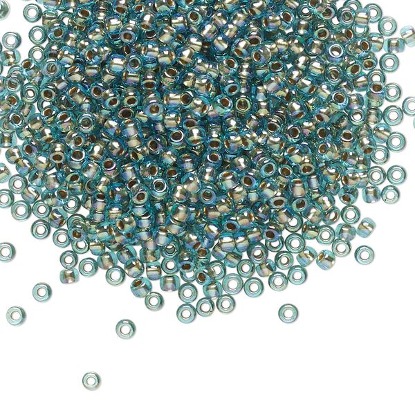 Seed bead, TOHO BEADS&reg;, glass, pkg/250g, #11 round, translucent gold-lined rainbow aqua (TR-11-995). image number 0