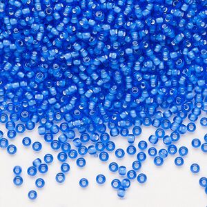 Seed bead, Preciosa Ornela, glass, transparent chalkwhite-lined sapphire, #11 rocaille. Sold per 500-gram pkg.