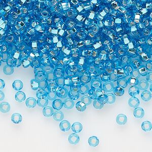 Seed bead, Preciosa Ornela Czech glass, pkg/50g, #11 rocaille, transparent silver-lined sky blue, (67010).
