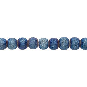 Bead, coated glass, opaque matte dark blue AB, 5-6mm uneven round. Sold per 15-1/2" to 16" strand.