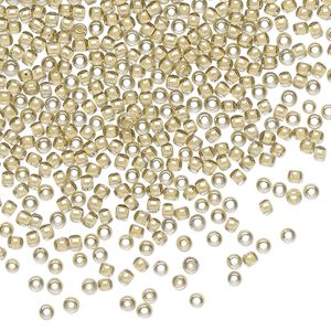 Seed bead, TOHO BEADS&reg;, glass, pkg/50g, #11 round, opaque orange cr&egrave;me-lined black diamond (TR-11-369).