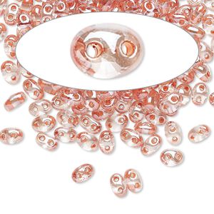 Seed bead, Preciosa Twin&trade; Czech glass, pkg/50g, 5x2.5mm oval, transparent peach terra color-lined clear, (38689).