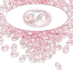 Seed bead, Preciosa Twin&trade; Czech glass, pkg/10g, 5x2.5mm oval, transparent pink terra color-lined clear, (38694).