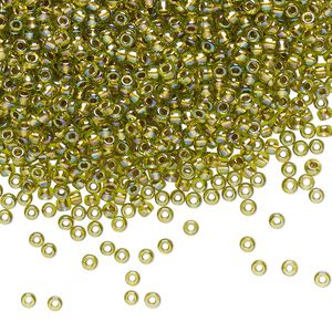 Seed bead, TOHO BEADS&reg;, glass, pkg/250g, #11 round, translucent gold-lined rainbow peridot (TR-11-996).