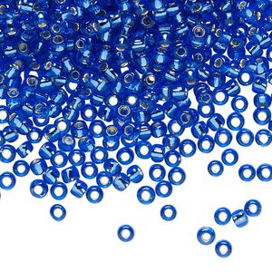 Seed bead, TOHO BEADS&reg;, glass, pkg/250g, #8 round, transparent silver-lined sapphire (TR-08-35).