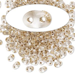 Seed bead, Preciosa Twin&trade; Czech glass, pkg/10g, 5x2.5mm oval, transparent bronze color-lined clear, (68106).