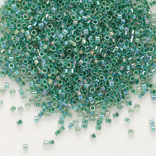 Seed bead, Delica&reg;, glass, pkg/250g, #11 round, translucent lime-lined rainbow crystal clear (DB-0060). image number 0