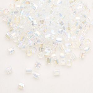Seed bead, Delica&reg;, glass, pkg/7.5g, #8 cut, translucent rainbow crystal clear (DBLC-0051).