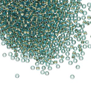 Seed bead, TOHO BEADS&reg;, glass, pkg/7.5g, #11 round, transparent gold-lined aqua (TR-11-284).