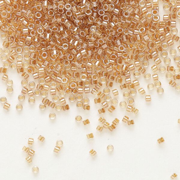Seed bead, Delica&reg;, glass, pkg/250g, #11 round, translucent honey beige-lined luster crystal clear (DB-0901). image number 0